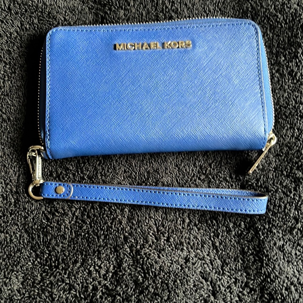 Cluch phone case with credit card holder.